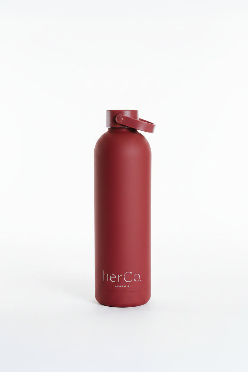 herCo. water bottle with lid cap on. 