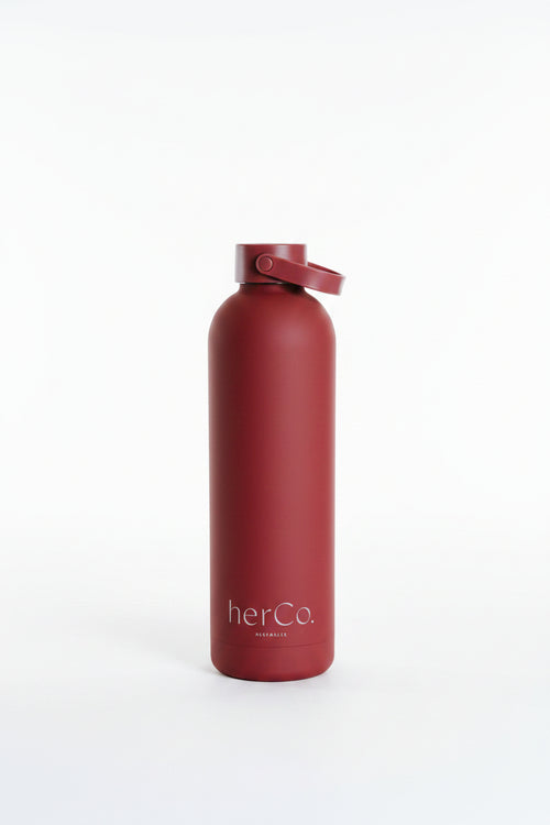 herCo. water bottle with lid cap on. 